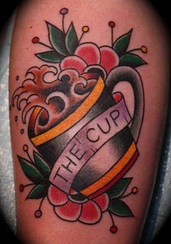 Colorful Coffee Cup With Banner And Flowers Tattoo Design