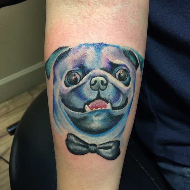 Colorful Pug Face With Bow Tattoo On Forearm