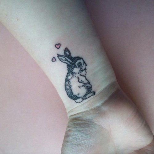 Cute Black Ink Rabbit Tattoo On Wrist