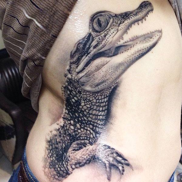 Cute Crocodile Baby Tattoo On Side Rib By Marshall