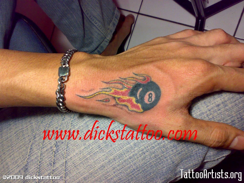 Eight Ball With Flame Tattoo On Hand