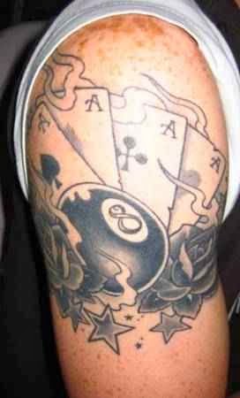 Eight Ball With Playing Cards And Stars Tattoo On Shoulder