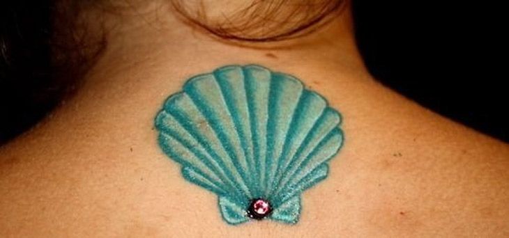 Green Ink Scallop Shell Tattoo On Back Neck