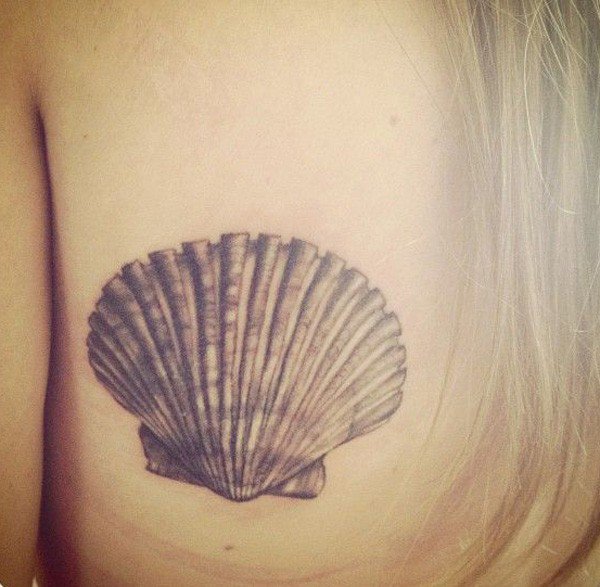 Grey Ink Shell Tattoo On Girl Left Back Shoulder