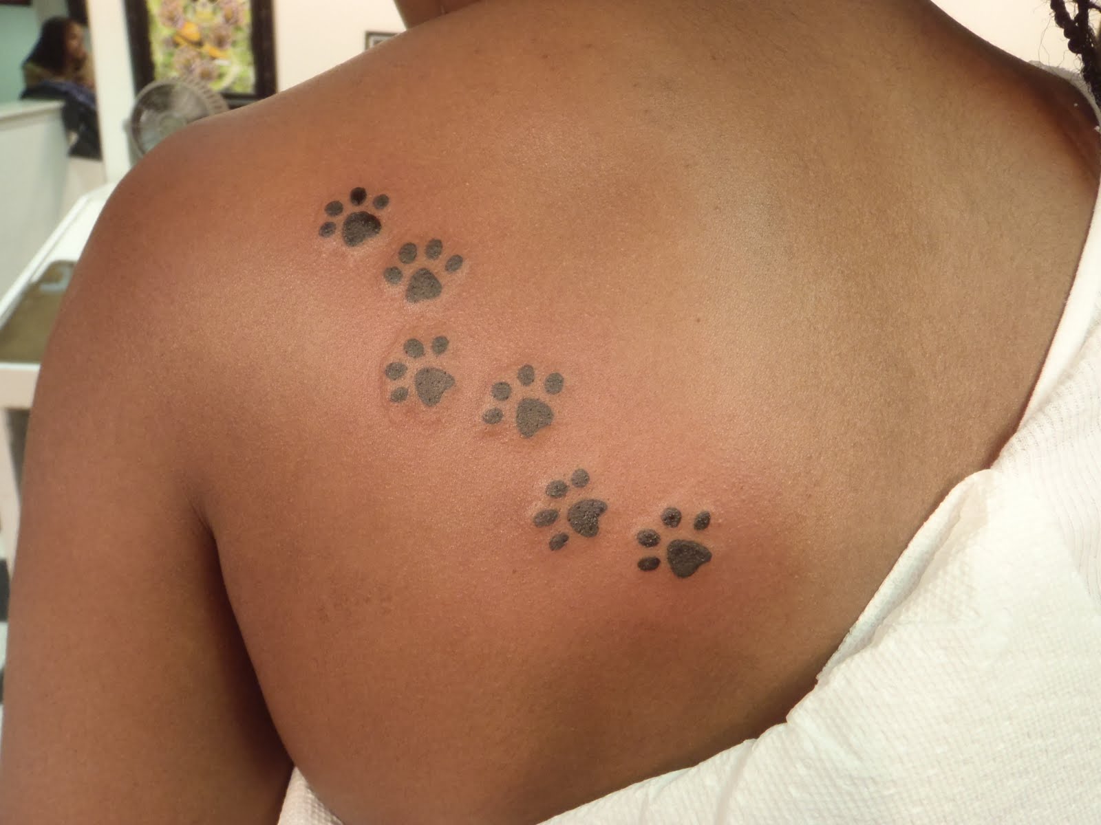 19 Leopard Paw Prints Tattoo Designs, Images And Pictures