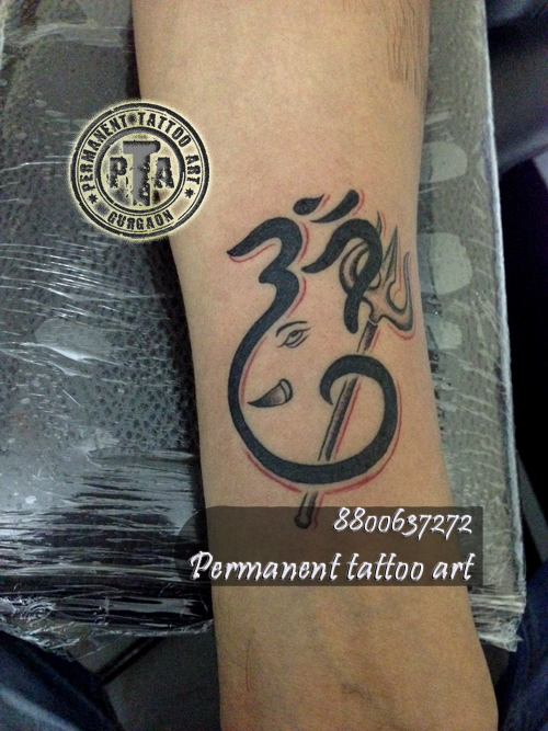 Lord Om Ganesha With Trishul Tattoo Design For Arm