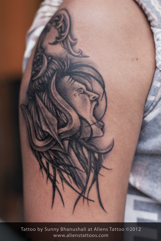 Lord Shiva Head With Trishul Tattoo On Right Shoulder