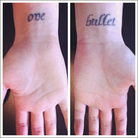 One Bullet Lettering Tattoo On Both Wrist