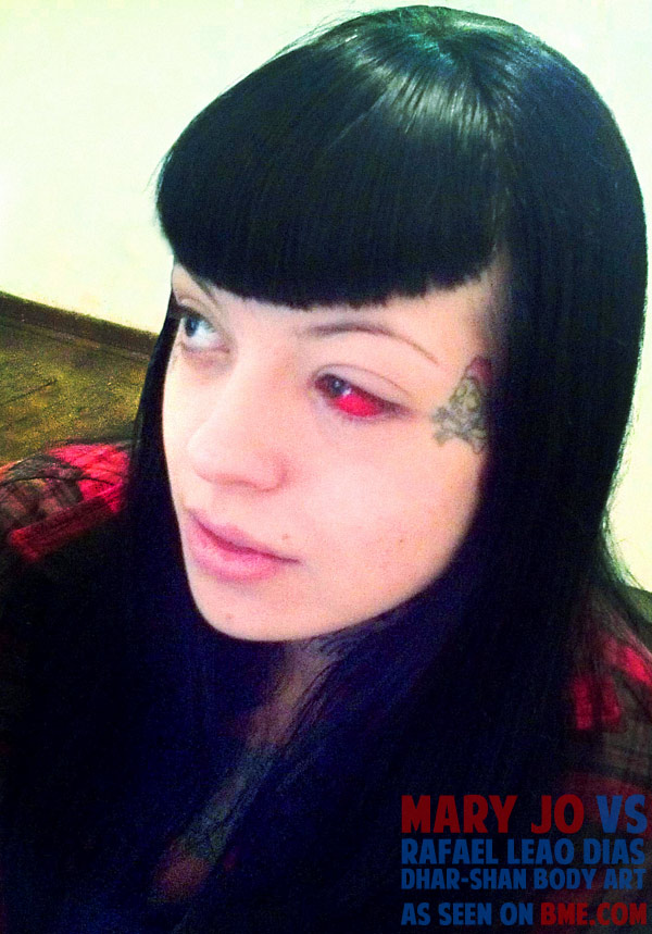 Red Ink Girl Left Eyeball Tattoo