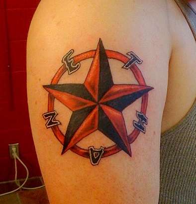 Red Nautical Star Tattoo On Right Shoulder