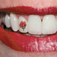 Red Rose Tattoo On Teeth