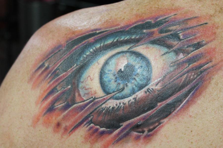 Ripped Skin Eyeball Tattoo Design For Shoulder By Richard Zappa