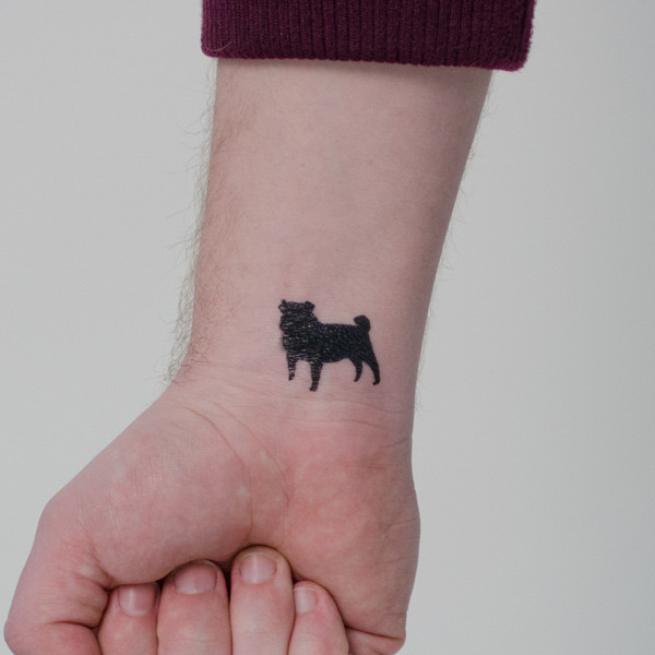 Silhouette Pug Dog Tattoo On Wrist