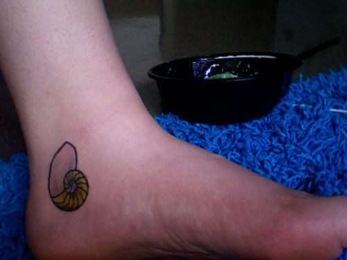 Spiral Shell Tattoo On Heel