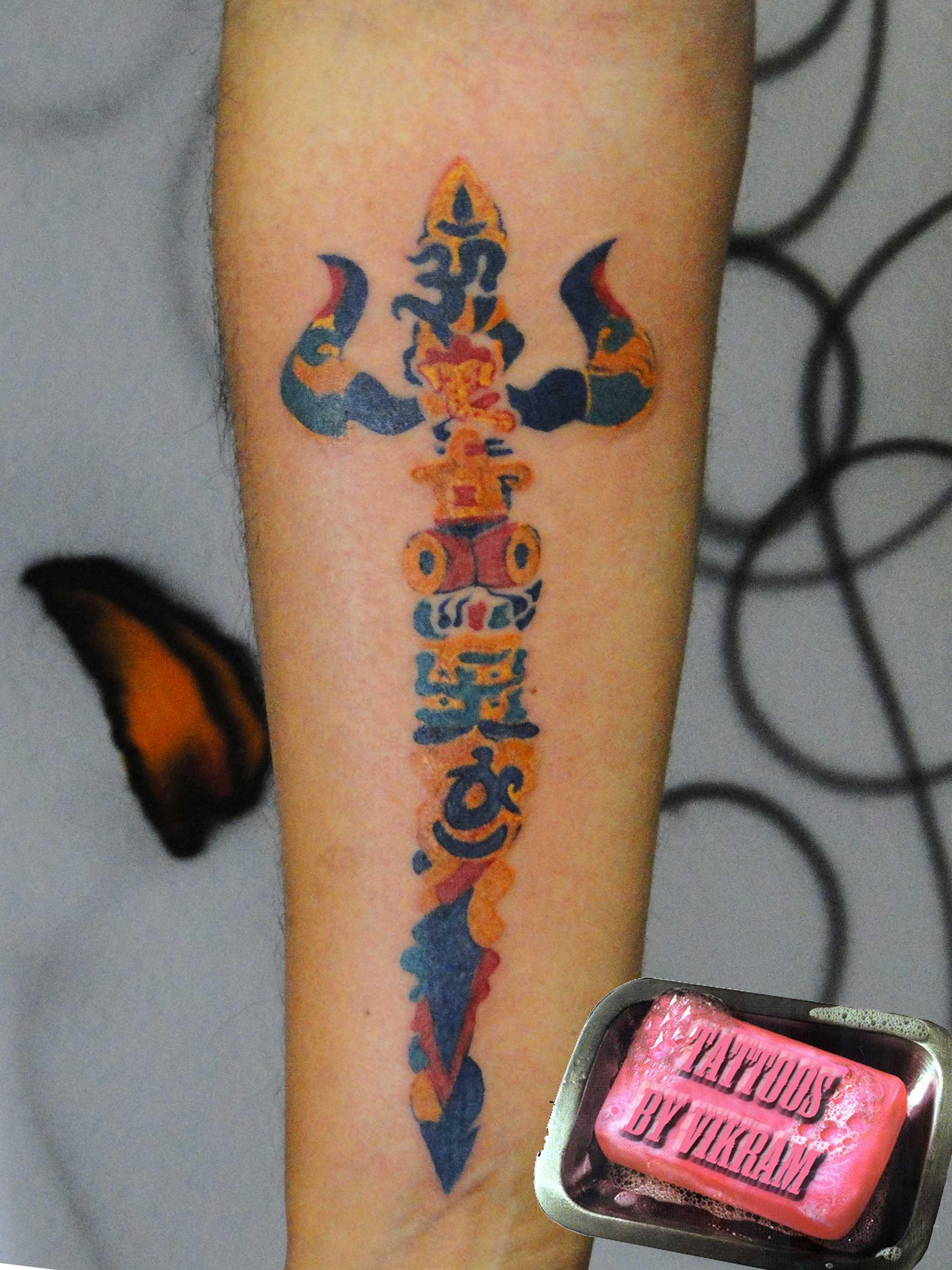 Unique Colorful Trishul Tattoo On Forearm By Vikram