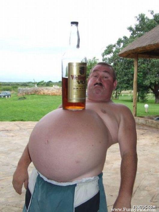 Wine Bottle On Fat Man Tummy Funny Picture