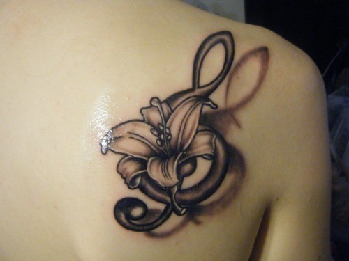 3D Treble Clef With Lily Flower Tattoo On Right Back Shoulder