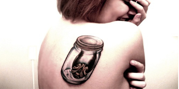 Amazing Harry Potter Snitch In Glass Container Tattoo On Right Back Shoulder