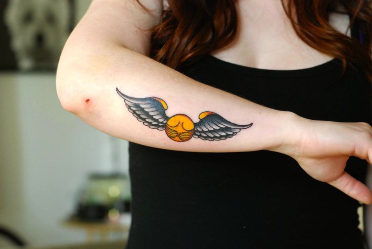 Amazing Harry Potter Snitch Tattoo On Girl Right Arm