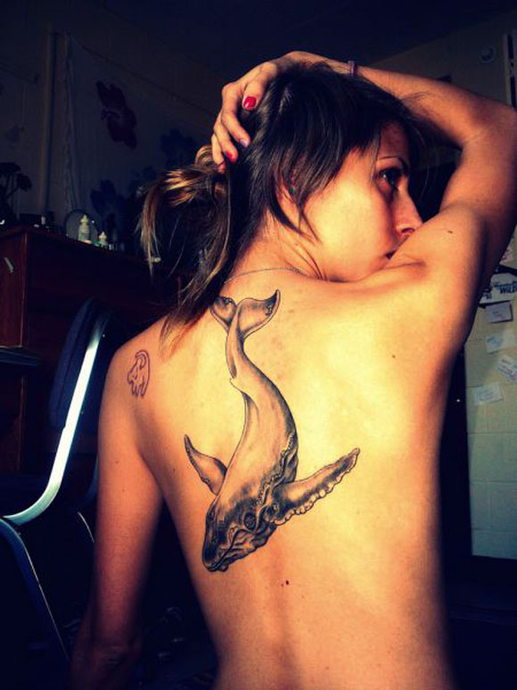 Black And Grey Whale Tattoo On Girl Upper Back