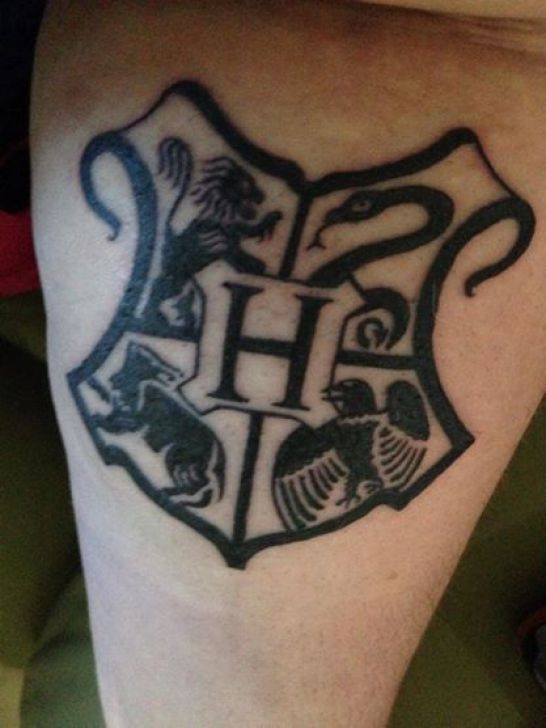 Black Ink Harry Potter Hogwarts Logo Tattoo Design For Arm