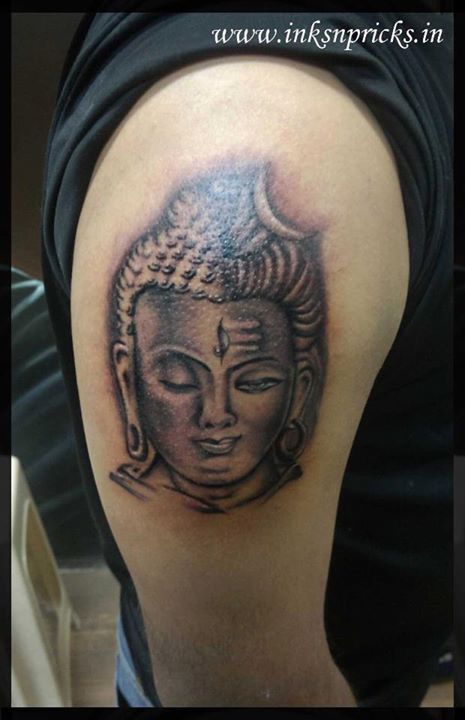 Black Ink Lord Shiva Head Tattoo On Right Shoulder