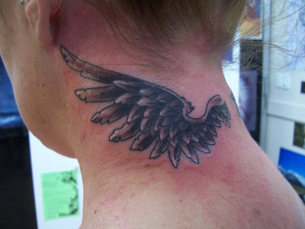 Black Ink Wing Tattoo On Back Neck