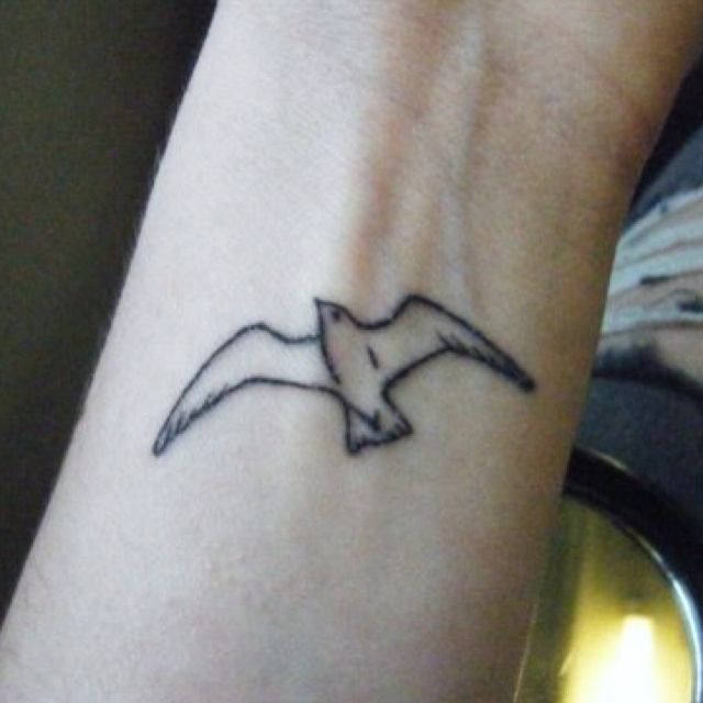 Black Outline Seagull Tattoo On Wrist
