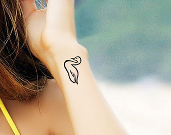 Swan tattoo for ladies