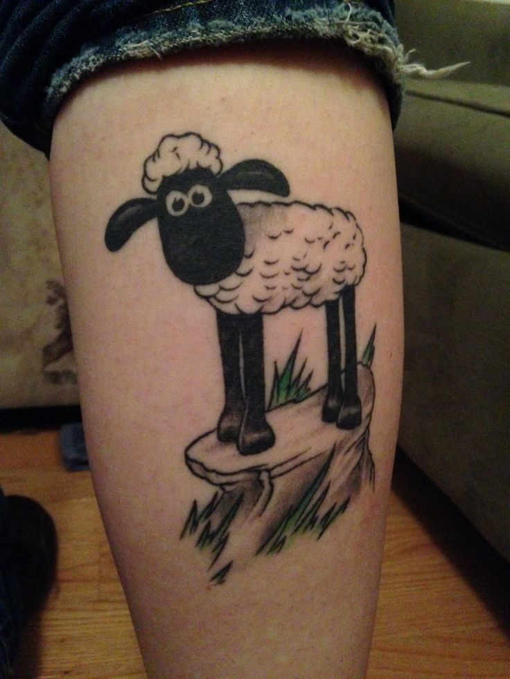 Black Shaun The Sheep Tattoo Design For Arm