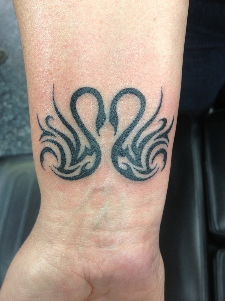 Black Tribal Two Swan Tattoo On Wrist