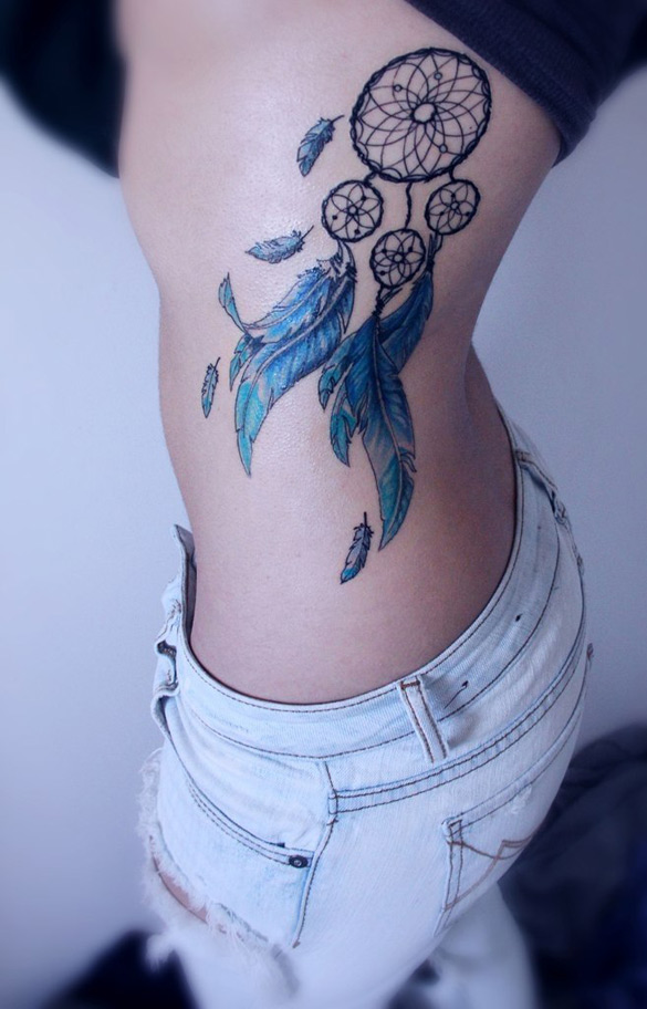 Blue Ink Dreamcatcher Tattoo On Girl Rib Cage