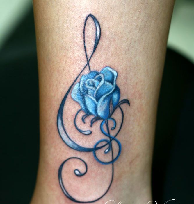 Blue Ink Treble Clef With Rose Tattoo Design By Lory