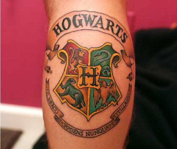 Colorful Harry Potter Hogwarts Logo Tattoo Design For Arm