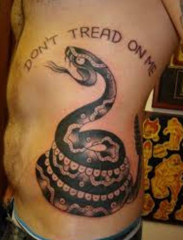 Don't Tread On Me - Black Ink Rattlesnake Tattoo On Man Side Rib