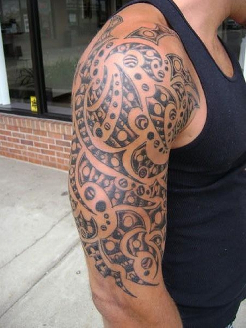 Grey and Black Tribal Tattoo On Man Right Sleeve