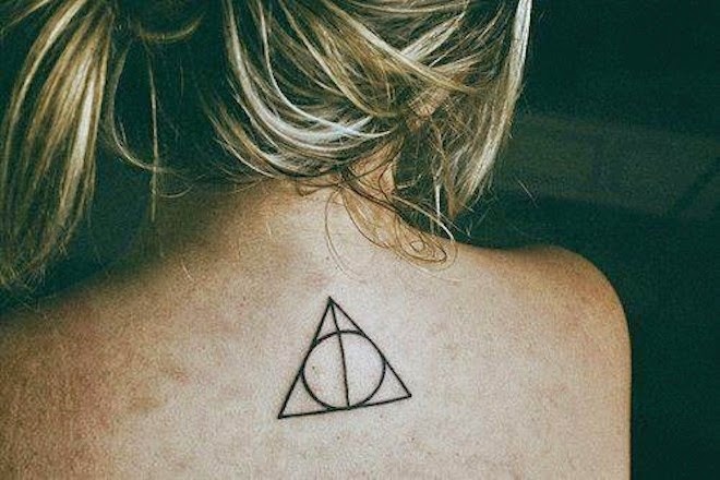 Harry Potter Deathly Hallows Symbol Tattoo On Girl Upper Back