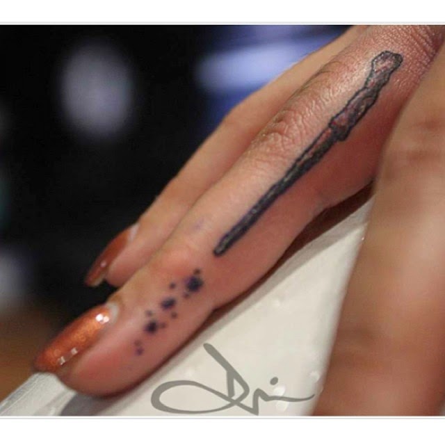 Harry Potter Wand Tattoo On Girl Finger