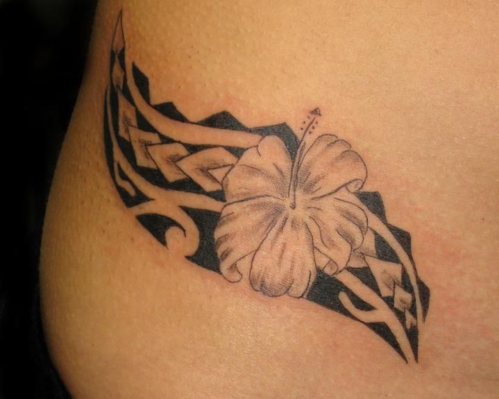 Hawaiian Tribal Flower Tattoo On Hip