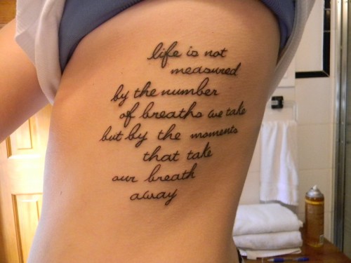 Life Is Not Measured by The Number Of Breaths We Take Love Quote Tattoo On Girl Rib Cage