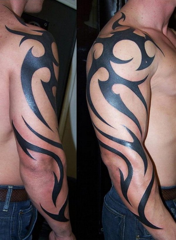 Man With Right Sleeve Tribal Tattoo