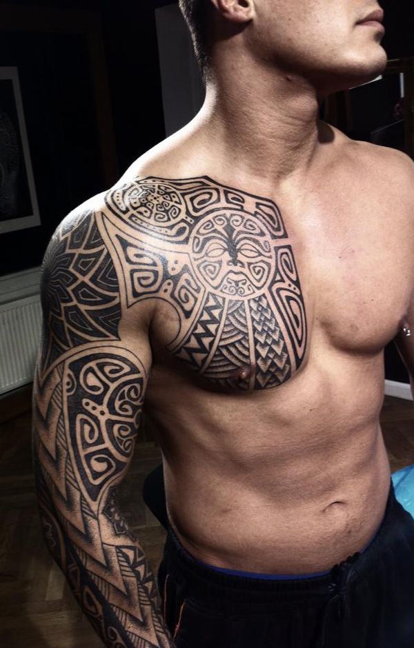Maori Tribal Tattoo On Man Chest And Sleeve