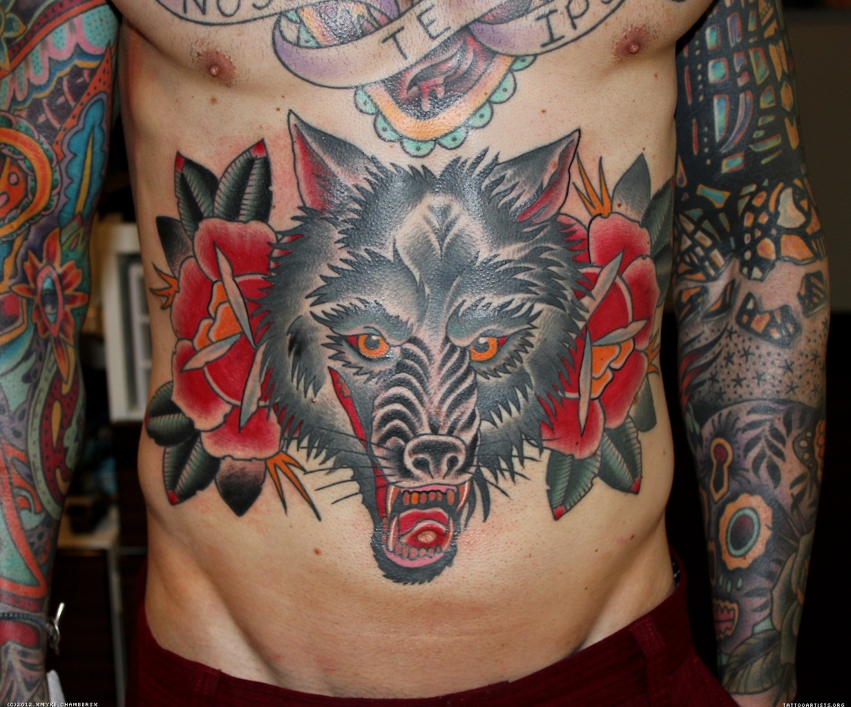 Red Rose Flowers And Traditional Wolf Head Tattoo On Belly