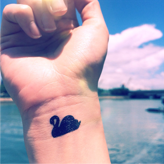 Silhouette Swan Tattoo On Wrist