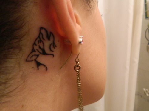 Simple Tribal Wolf Head Tattoo Behind The Ear