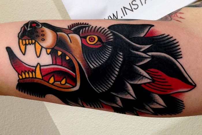 Traditional Wolf Head Tattoo On Arm by Jonathan Montalvo