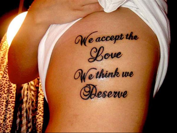 We accept the Love We Think We Deserve Quote Tattoo On Rib For Men