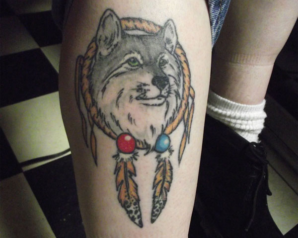 Wolf Head In Dreamcatcher Tattoo On Leg
