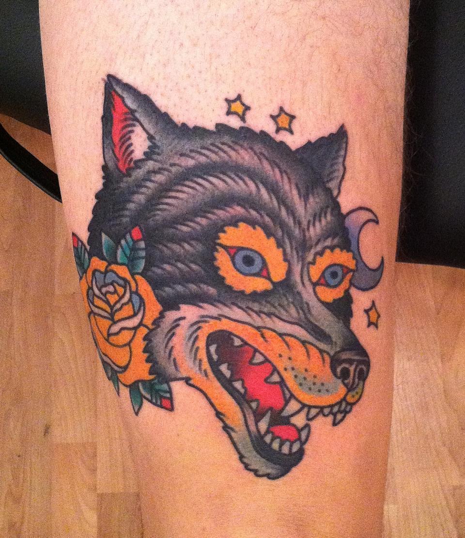 Yellow Rose Flowers And Wolf Head Tattoo On Leg