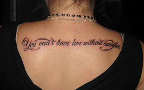 You Can’t Have Love Without Sacrifice Quote Tattoo On Upper Back